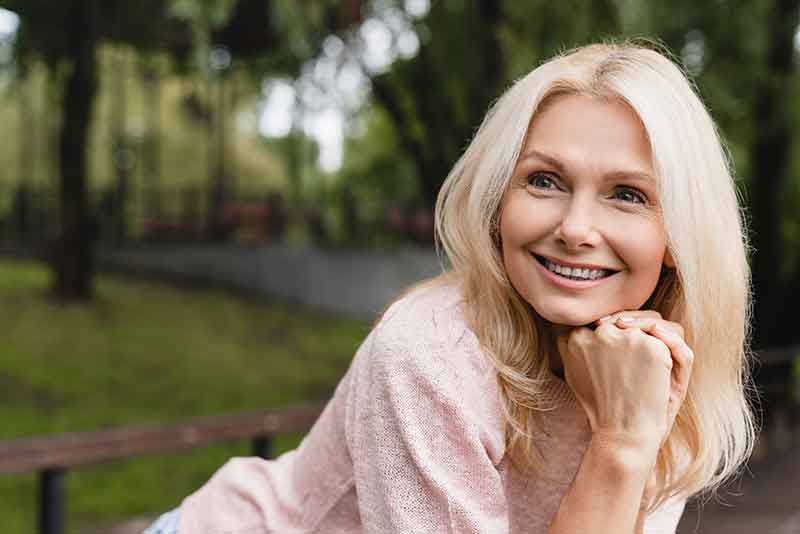 Smiling lady - menopause care at Mna Womens Clinic